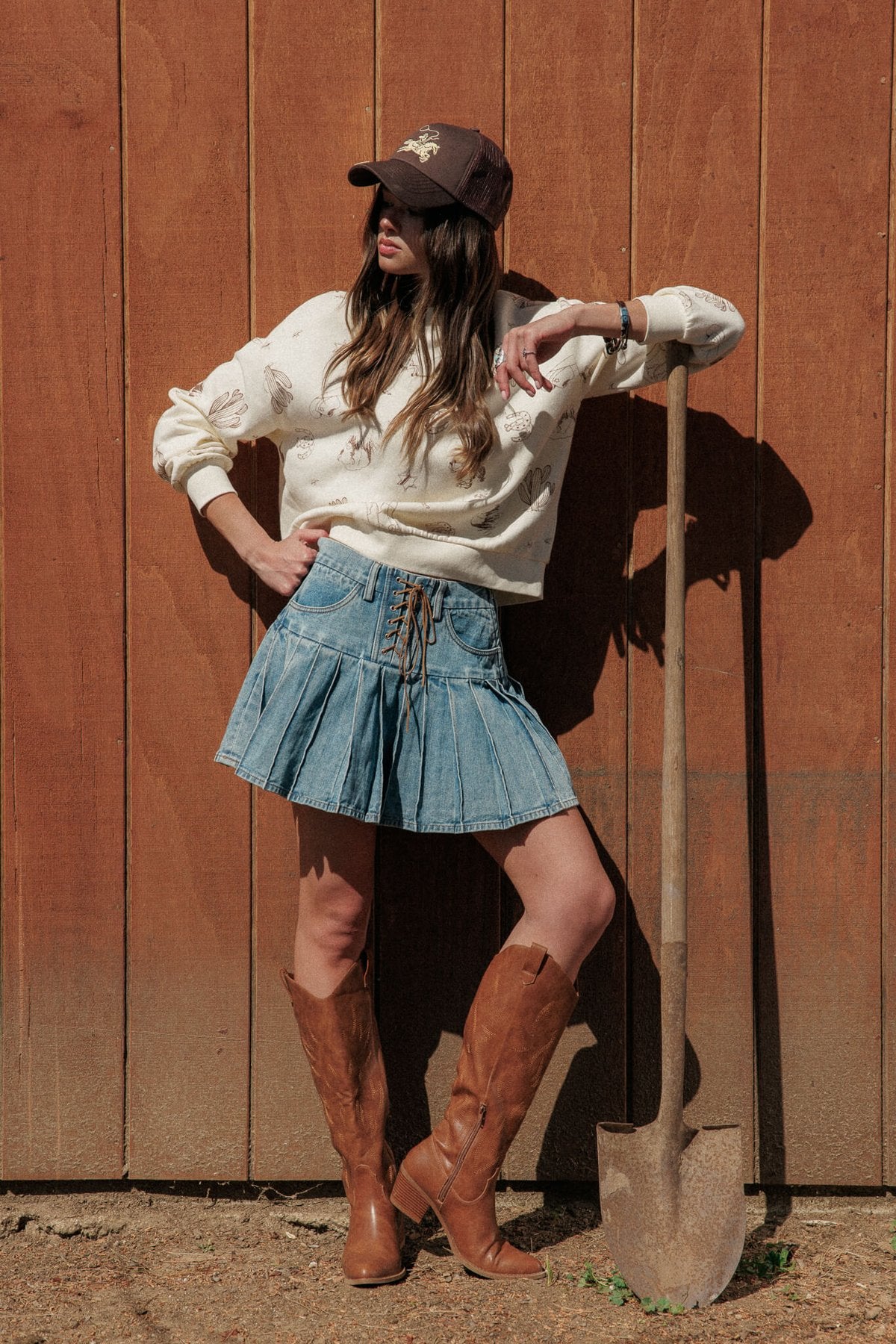 Lace Up Front Pleated Denim Mini Skirt
