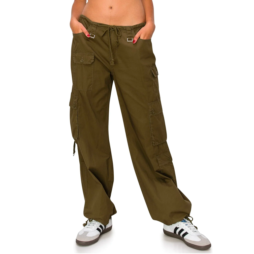 A woman wearing olive cargo pants