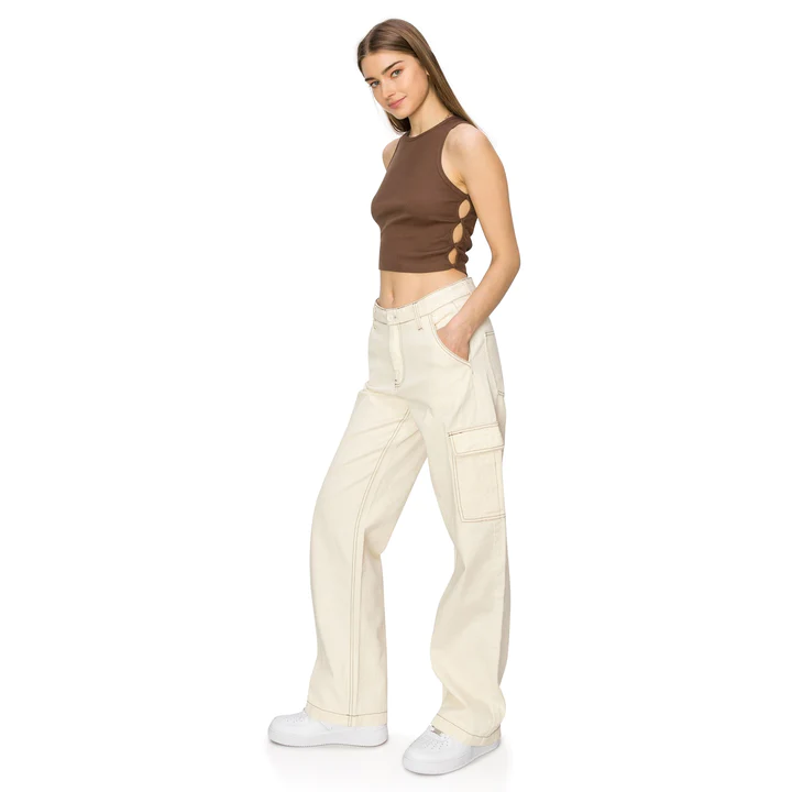 A woman wearing Cali1850 cargo pants in ivory